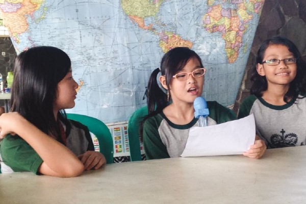 Students presenting the news